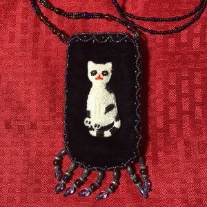 Blue velvet cat pouch necklace
